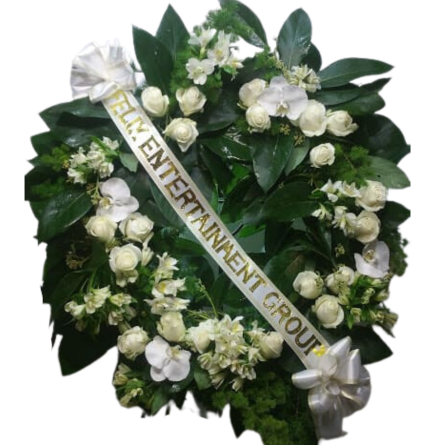 Imagen de En paz Descripcion: Corona fúnebre con 20 rosas, astromelias, nardos perfumados para darle un delicioso olor