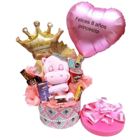 Imagen de Dulce princesa Descripcion: Canasta rosa con perlitas, peluche grande con sonido, corona cumpleaños,globo personalizado, globo coronita, nutella, 3 marroc, shot, block,rocklets, milka castañas feliz día, papas fritas pringles,2 bon o bon.

 