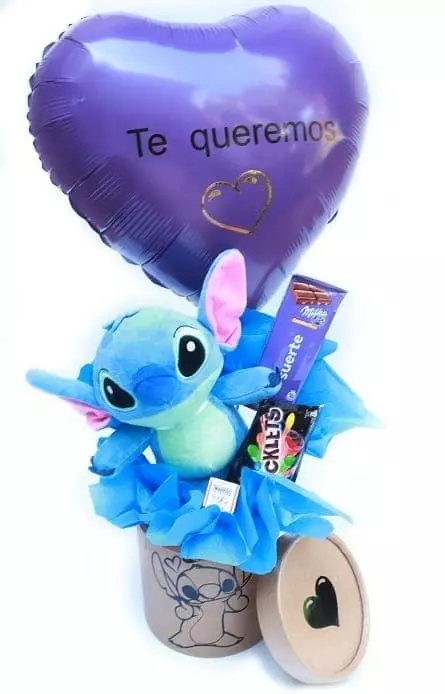 Imagen de Ohana Descripcion: Canasta stitch con peluche stitch rocklets, milka con frase, marroc y globo personalizado.