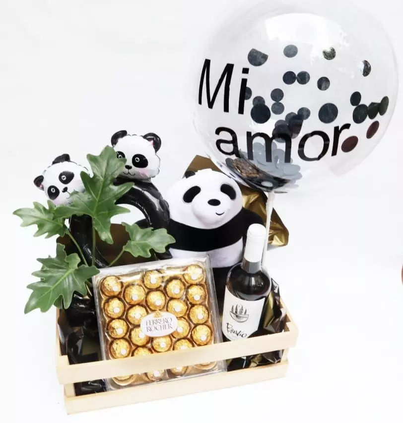 Imagen de Osita Mia Descripcion: Caja chocolates ferreros rocher, vino fino, planta de interior, vincha globo y globo burbuja personalizado.